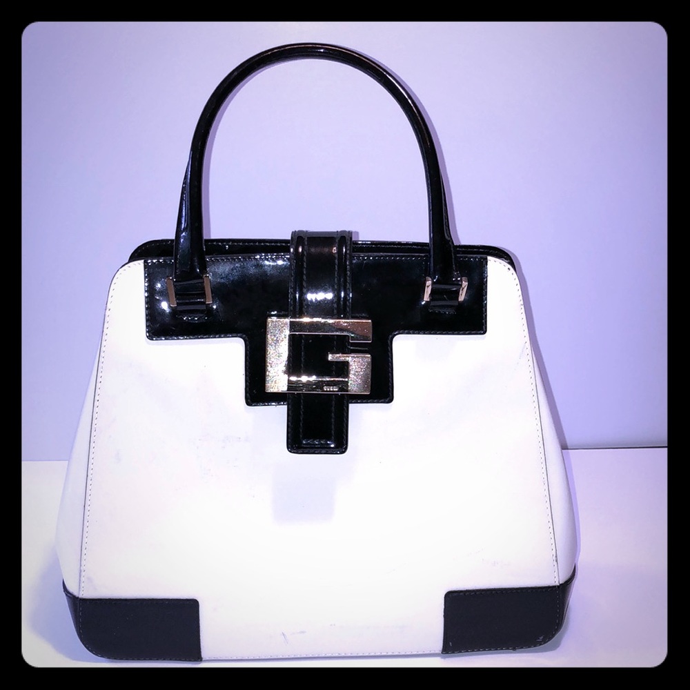 Authentic Gucci black and Ivory handbag